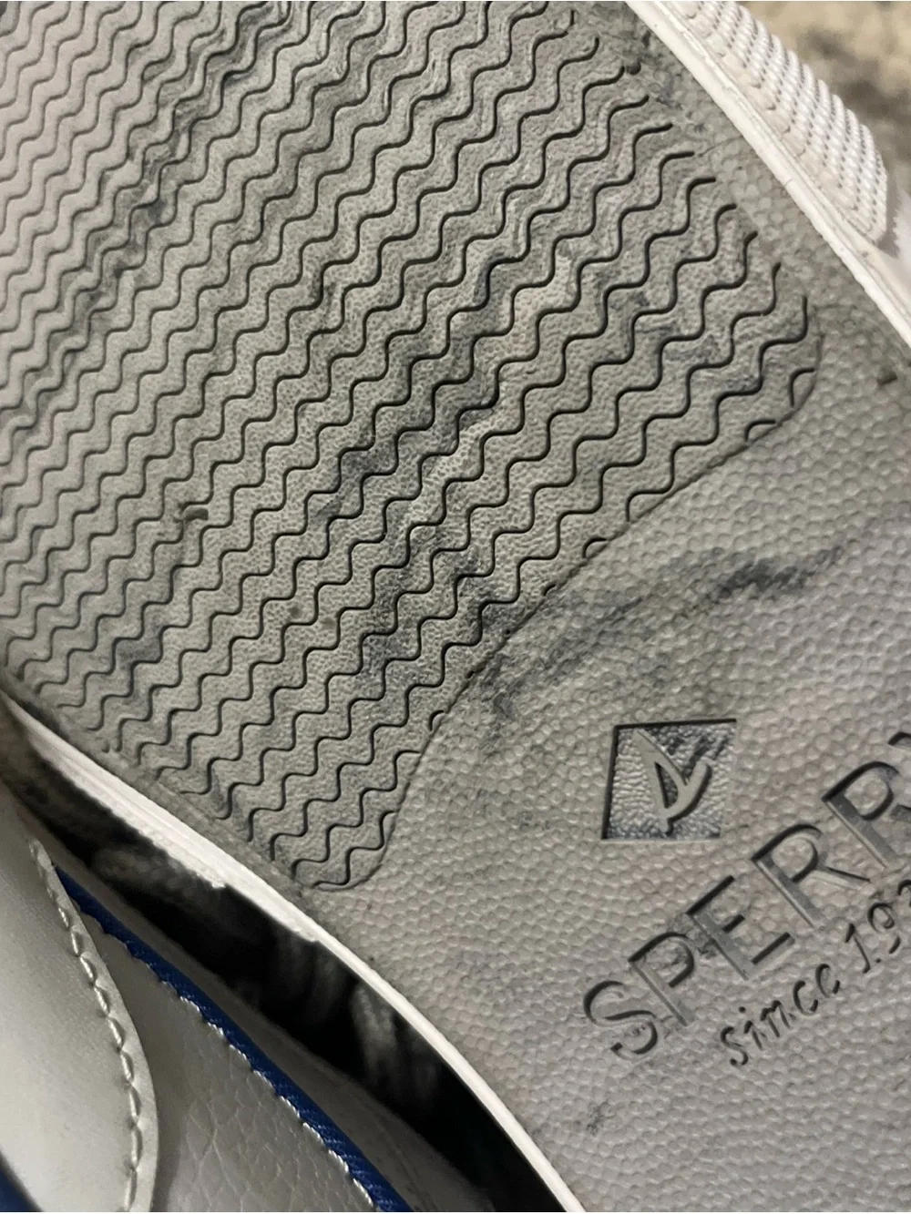Sperry Men’s Light Gray Perforated Boat Shoes with Blue Accent